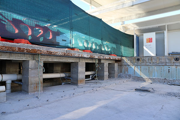 Inside shell of the active pool at the MAAC showing the plumbing