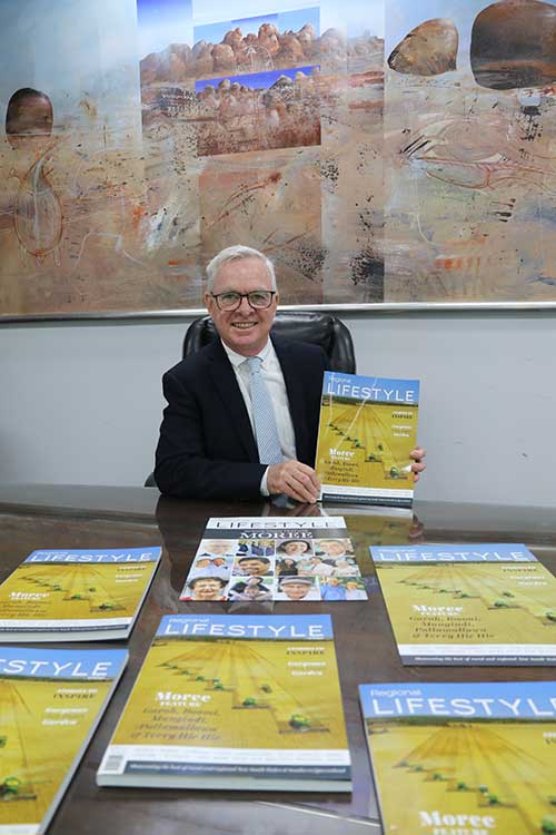  Mayor Mark Johnson showcasting the winter edition on sale today